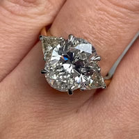 Two-Tone Oval Cut Three Stone Sterling Silver Engagement Ring